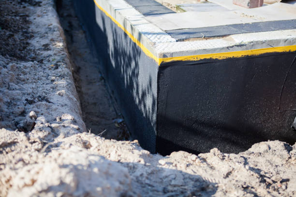 Professional Waterproofing technician working in Phenix City, AL